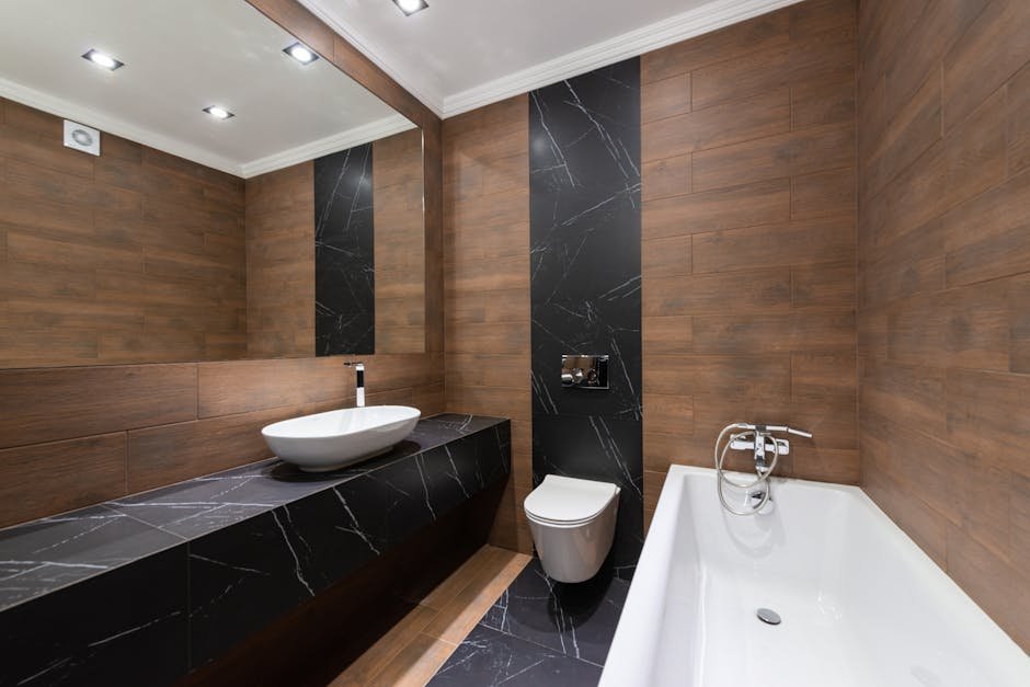 Modern bathroom with wooden accents, sleek fixtures, and minimalist design.