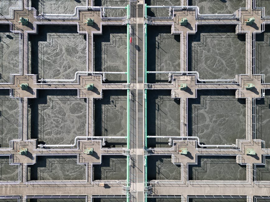 Aerial shot of a water treatment plant showing complex industrial design.